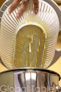 The holes of a sieve are perfect for cooking Nocken (Austrian Spaetzle)