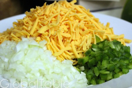The smaller you slice the peppers and onions, the less crunch the finished dish will have.