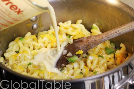 Working with hot pasta melts the flavors together quicker