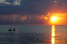 Sunset on 7 Mile Beach, Negril, Jamaica. Photo by Chaoleonard.