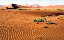 Ancient dunes from the Namib-Naukluft Park in Namibia, Africa. Photo by Bjørn Christian Tørrissen.