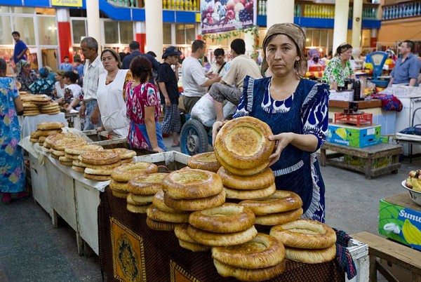 Tajik woman selling bread on a market. Photo by Steve Evans.