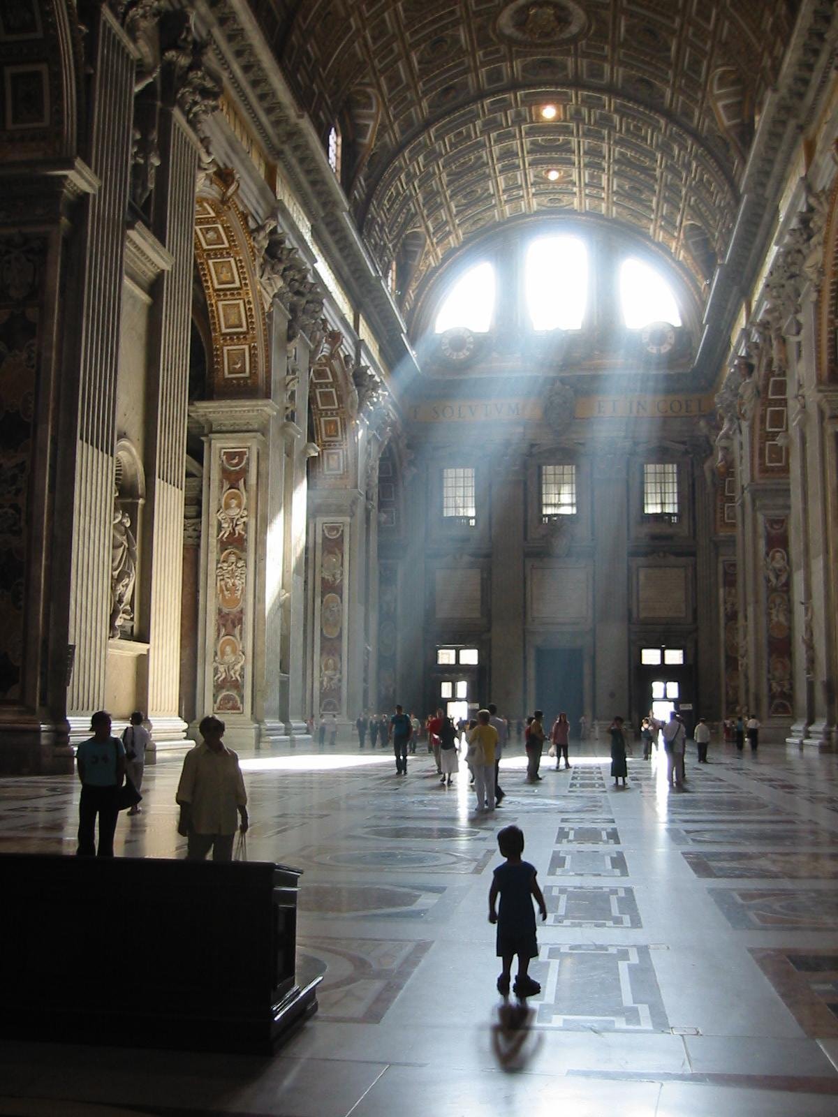 Light streaming into St Peter's Basillica, Vatican City, Rome, Italy. Photo by Jeb.
